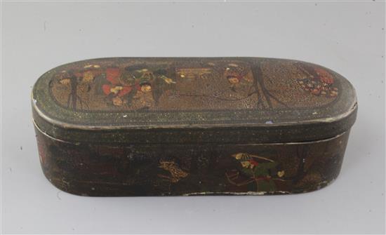 A 19th century Persian Qajar lacquered and gilt scribes casket (Qalamdan), height 3.25in. width 11in